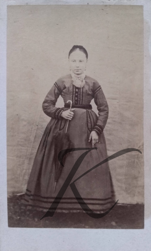 Kobieta z parasolką 1860s